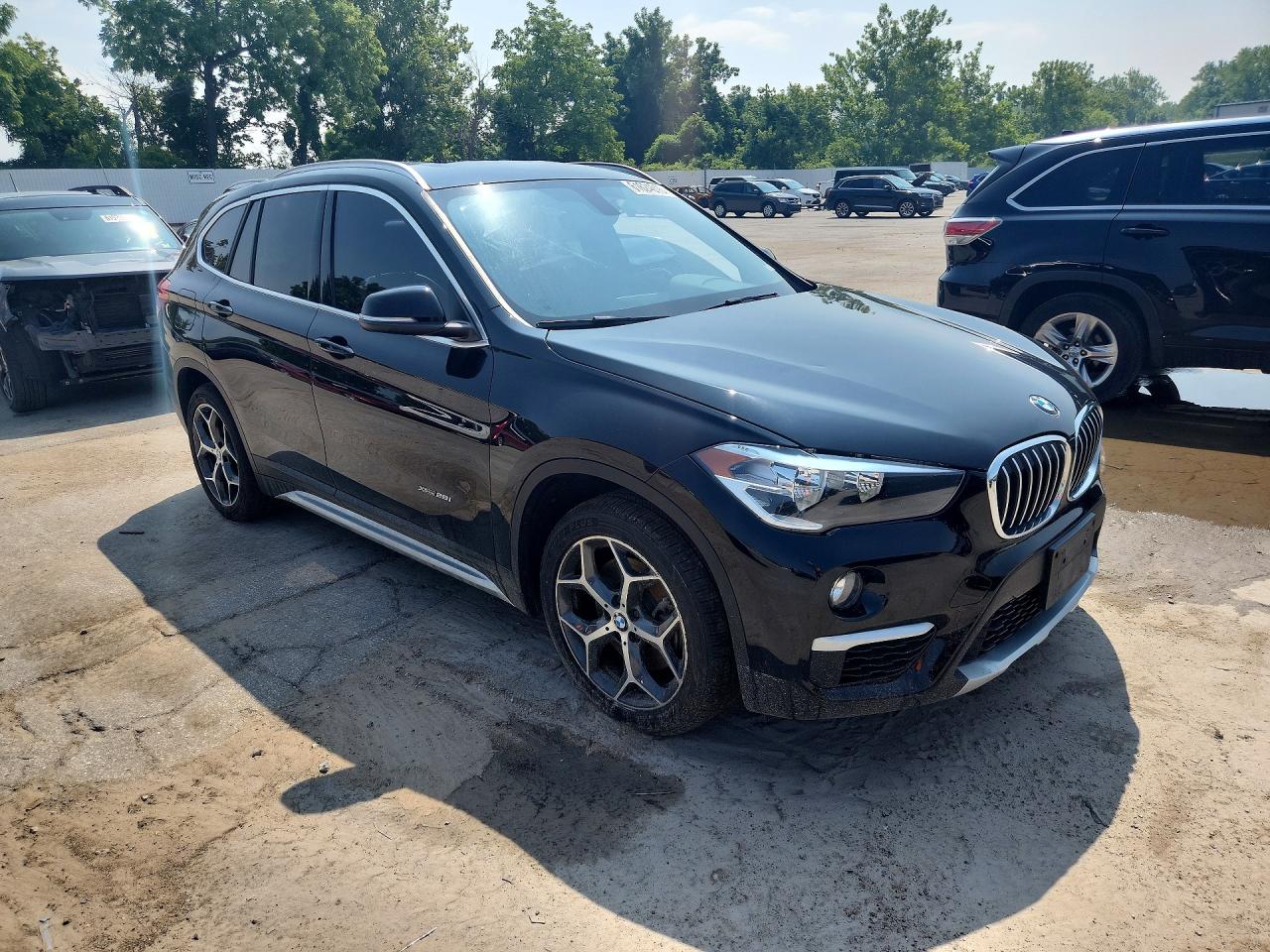 WBXHT3C37G5E50328 · 2016 BMW X1 · 4/13