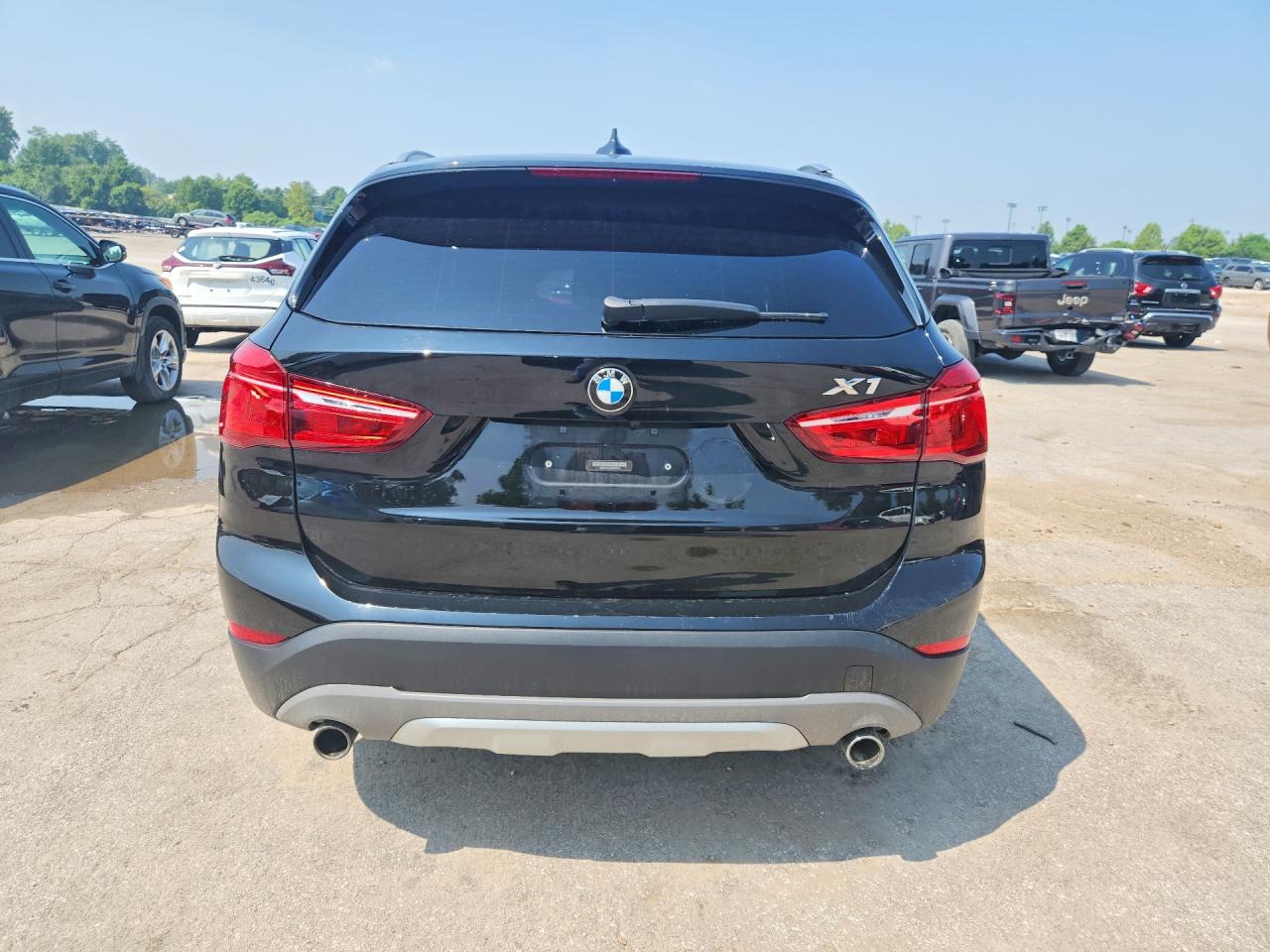 WBXHT3C37G5E50328 · 2016 BMW X1 · 6/13