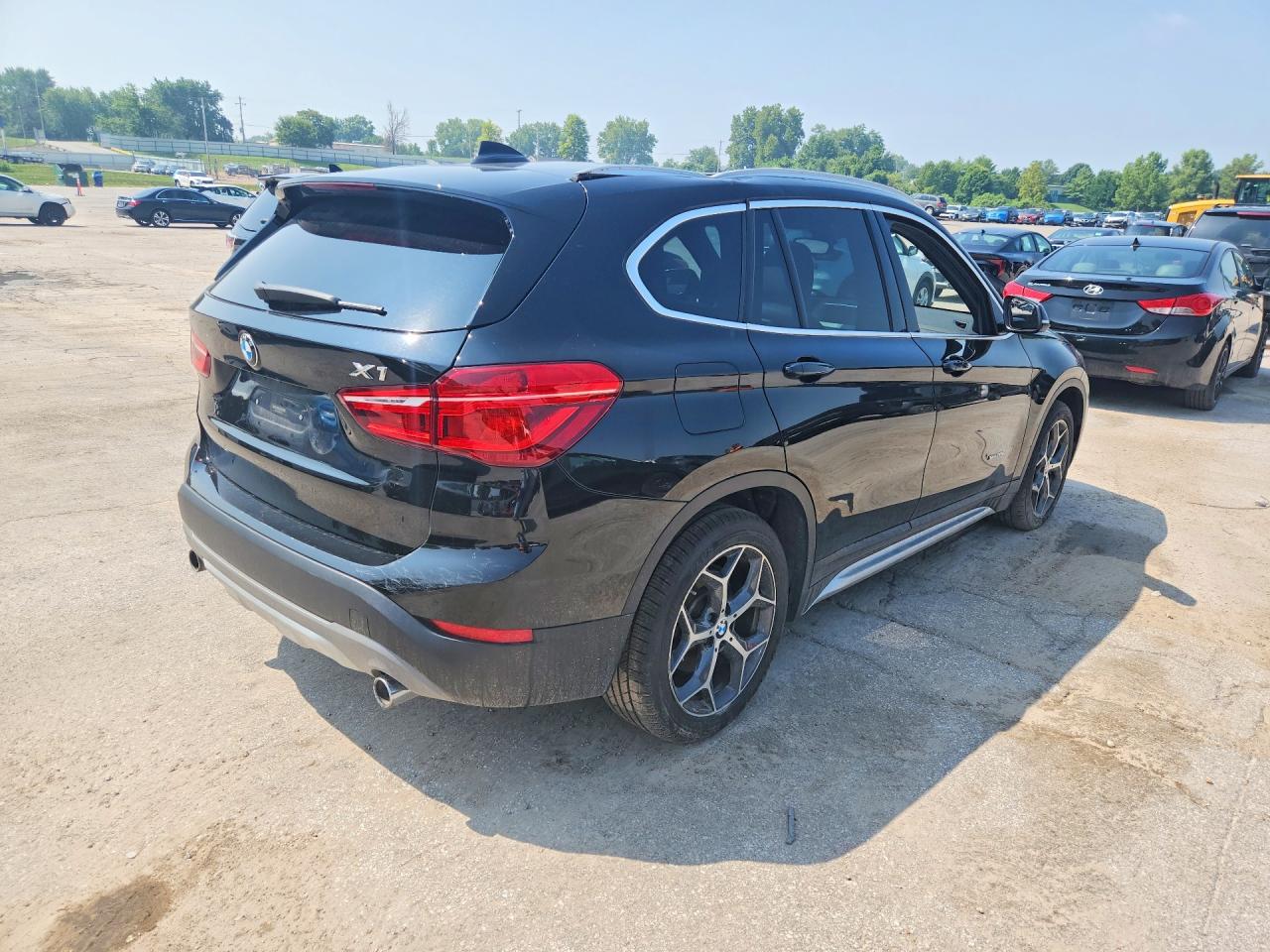 WBXHT3C37G5E50328 · 2016 BMW X1 · 3/13