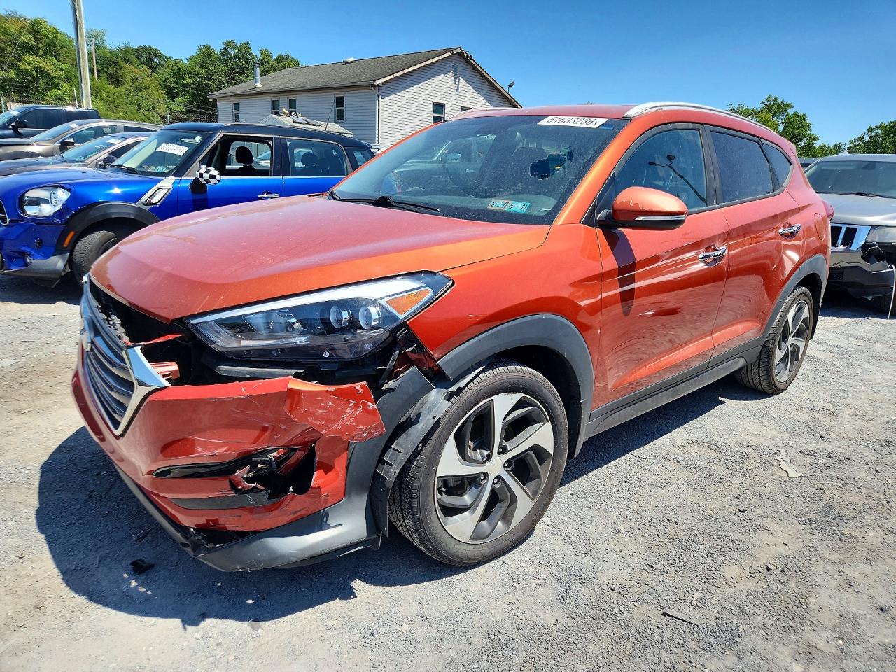 KM8J3CA21GU168242 · 2016 HYUNDAI TUCSON