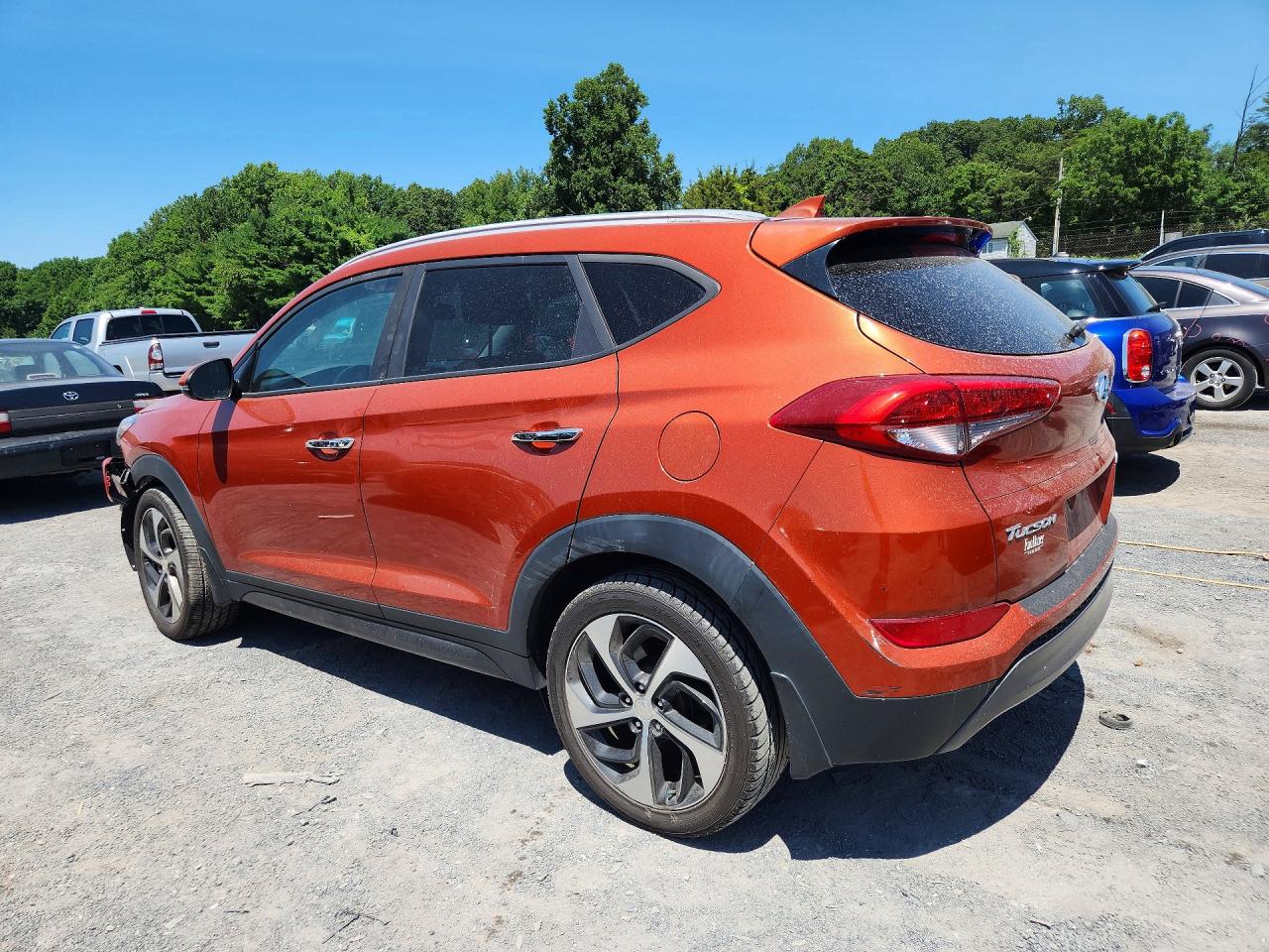 KM8J3CA21GU168242 · 2016 HYUNDAI TUCSON · 2/13