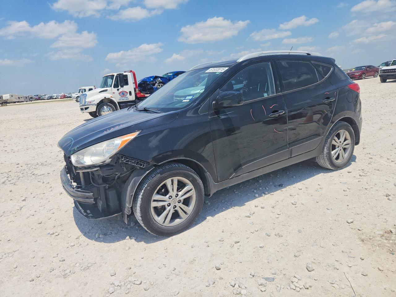 KM8JU3AC1BU301810 · 2011 HYUNDAI TUCSON