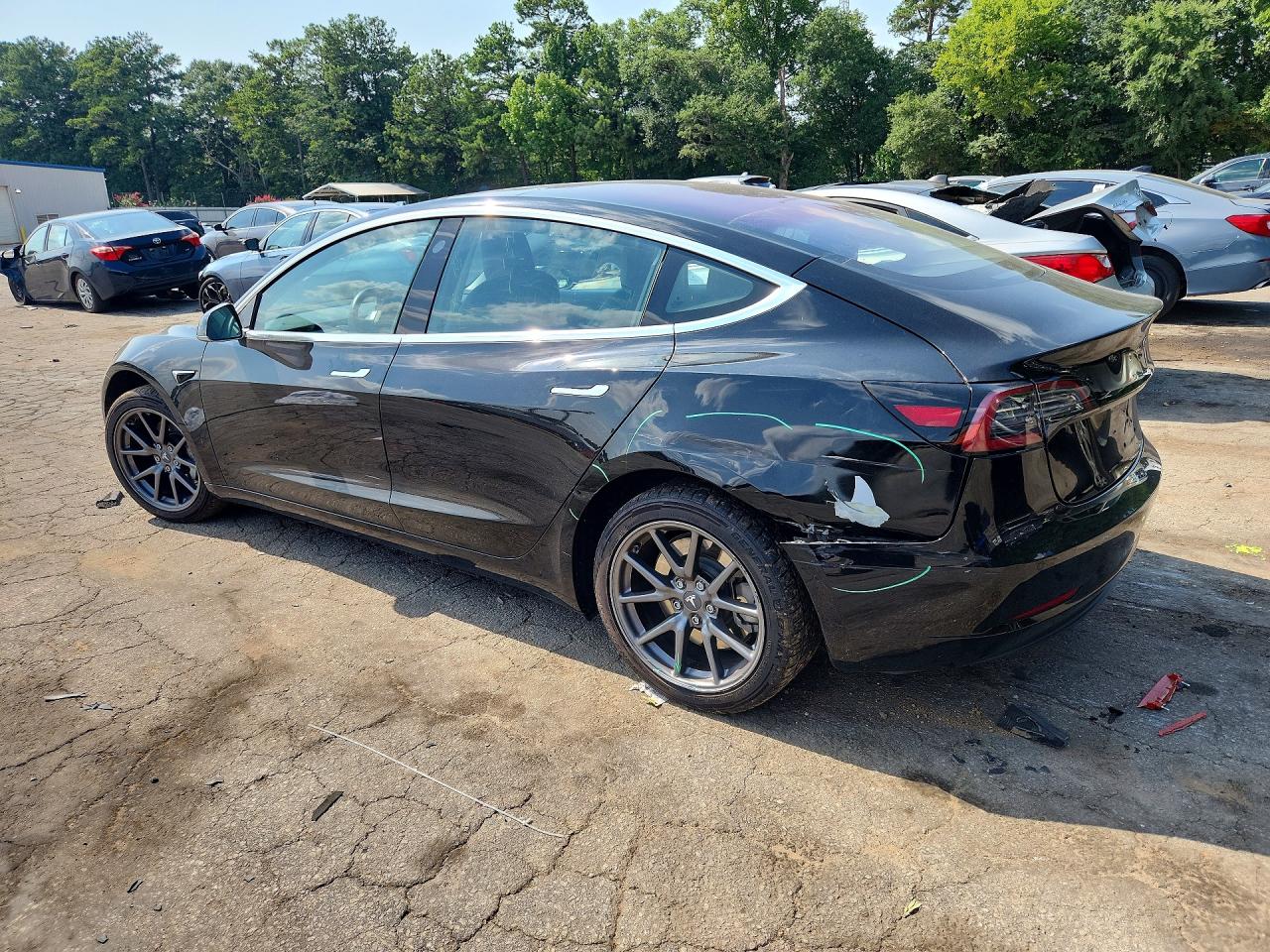 5YJ3E1EA1JF003918 · 2018 TESLA MODEL 3 · 2/12