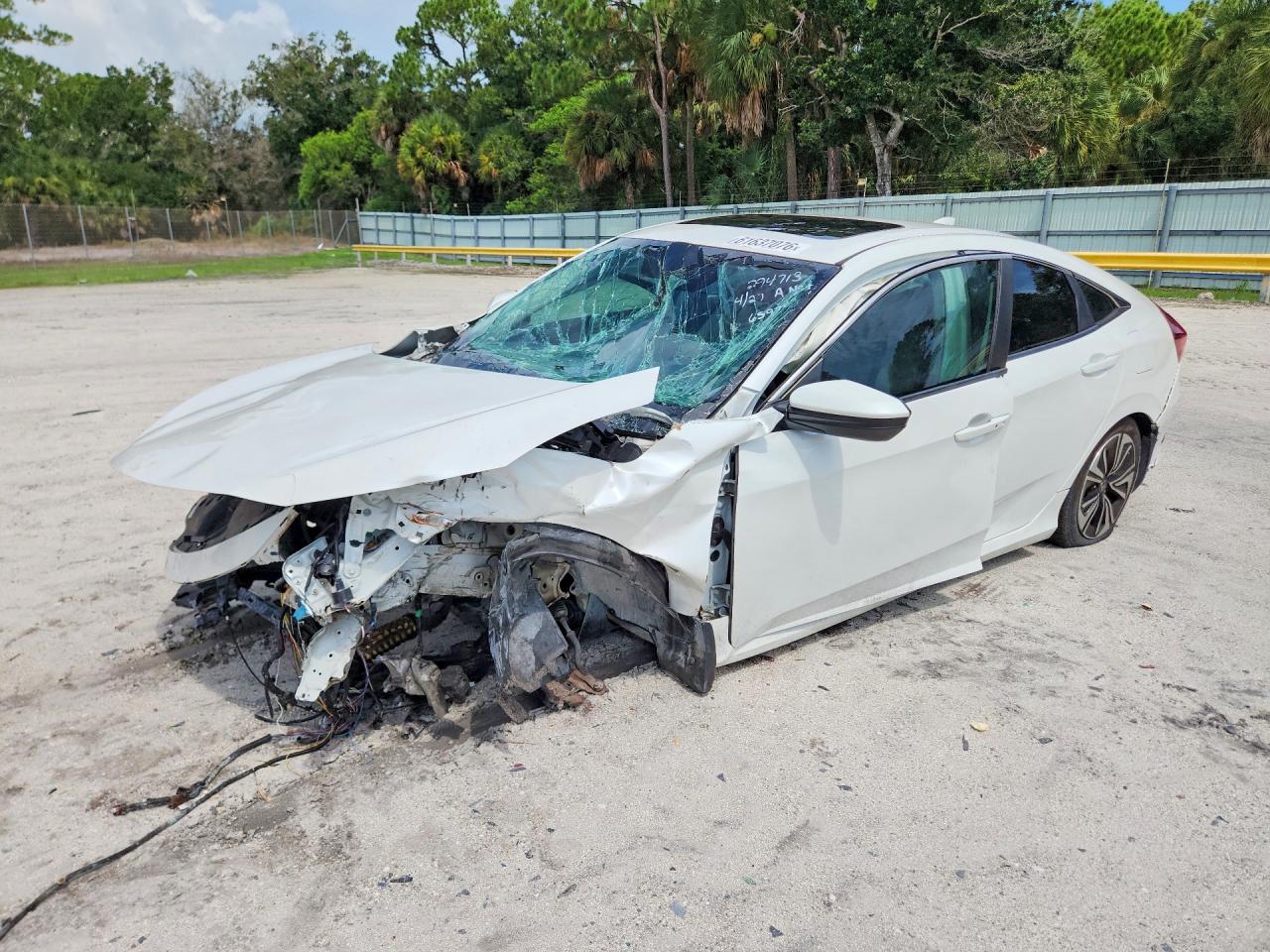 2HGFC1F3XGH659705 · 2016 HONDA CIVIC