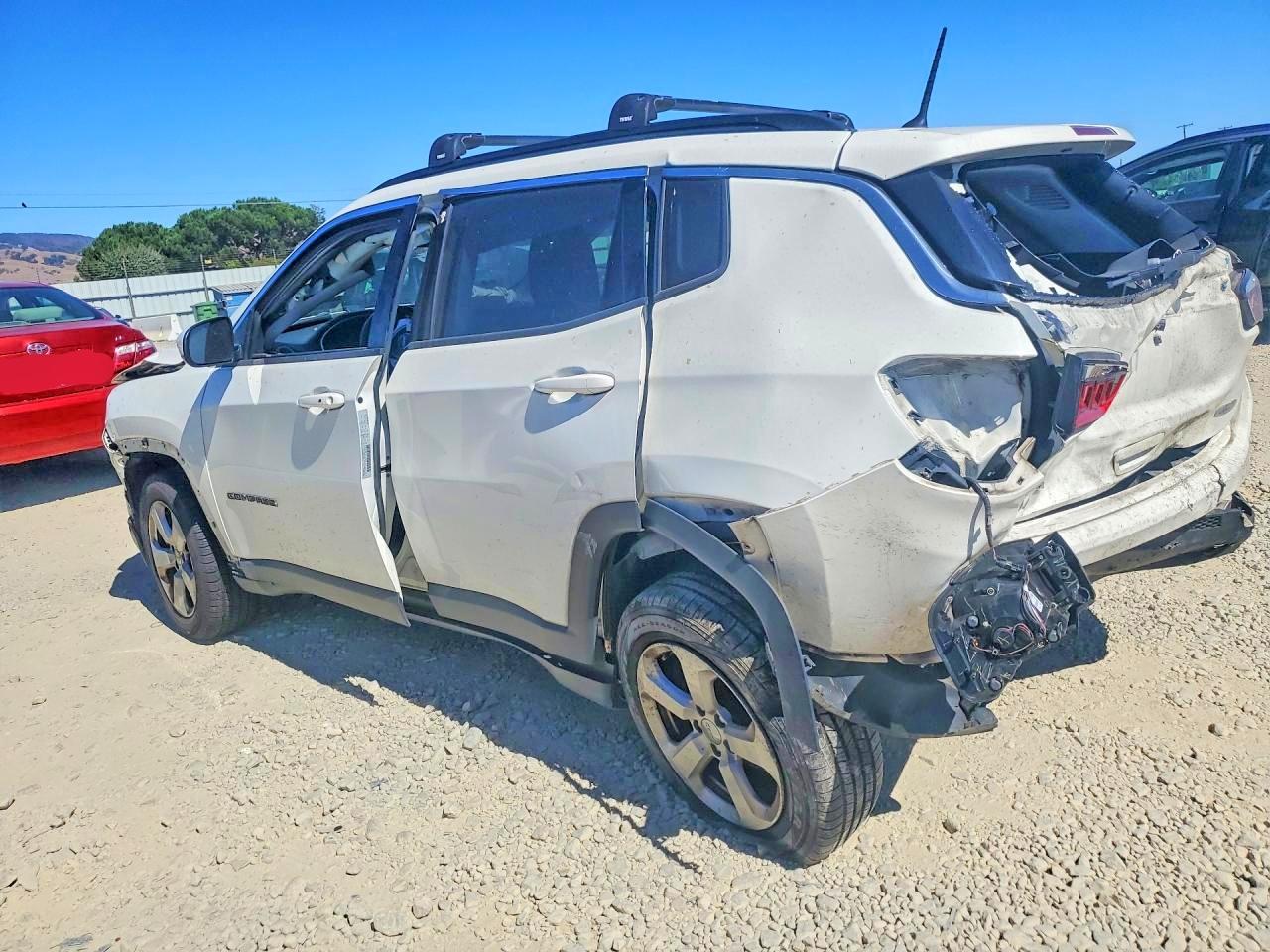3C4NJDBB9JT113930 · 2018 JEEP COMPASS · 2/13