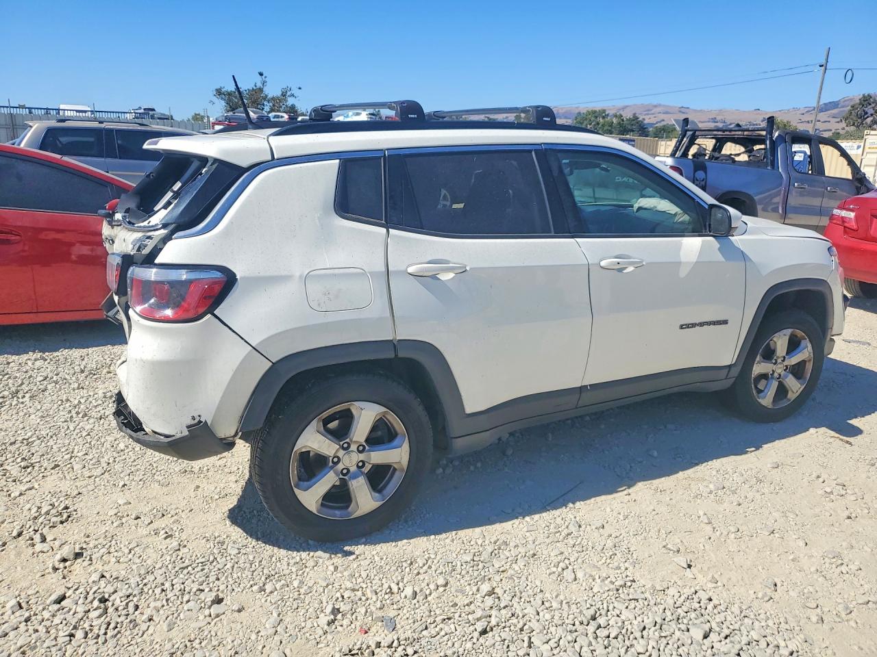 3C4NJDBB9JT113930 · 2018 JEEP COMPASS · 3/13
