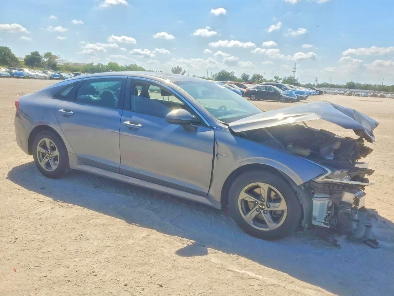 5XXG14J22MG075306 · 2021 KIA K5 · 4/13
