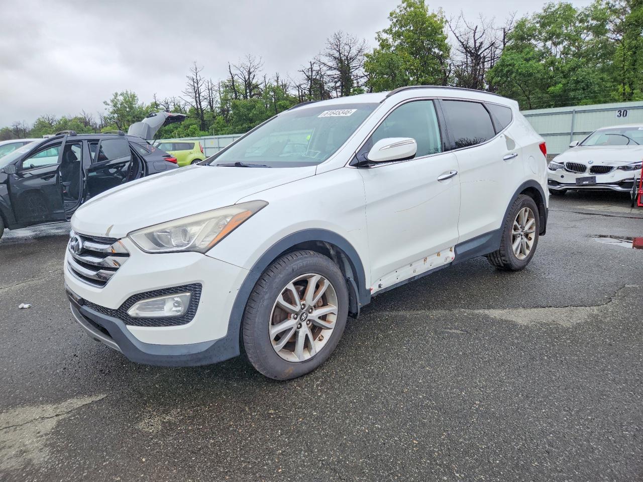 5XYZUDLA2EG199321 · 2014 HYUNDAI SANTA FE SPORT