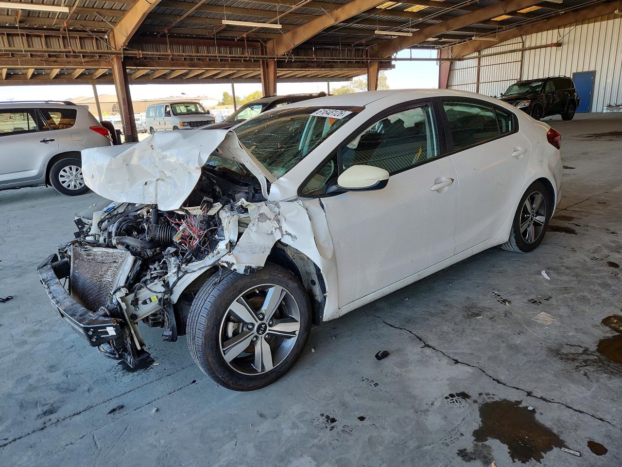 3KPFL4A77JE174158 · 2018 KIA FORTE