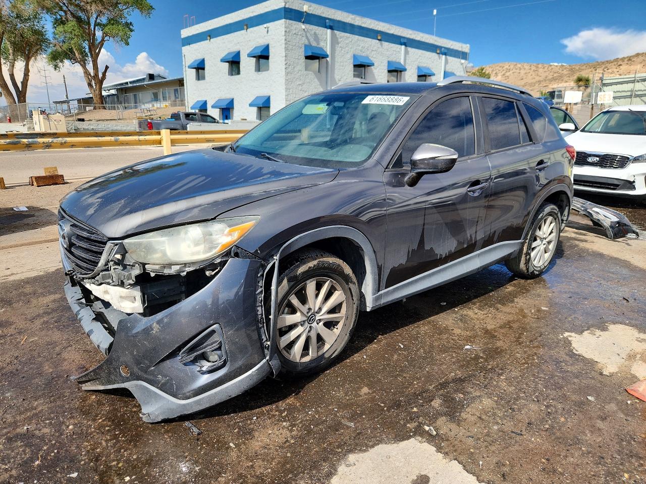JM3KE2CY0G0676215 · 2016 MAZDA CX-5