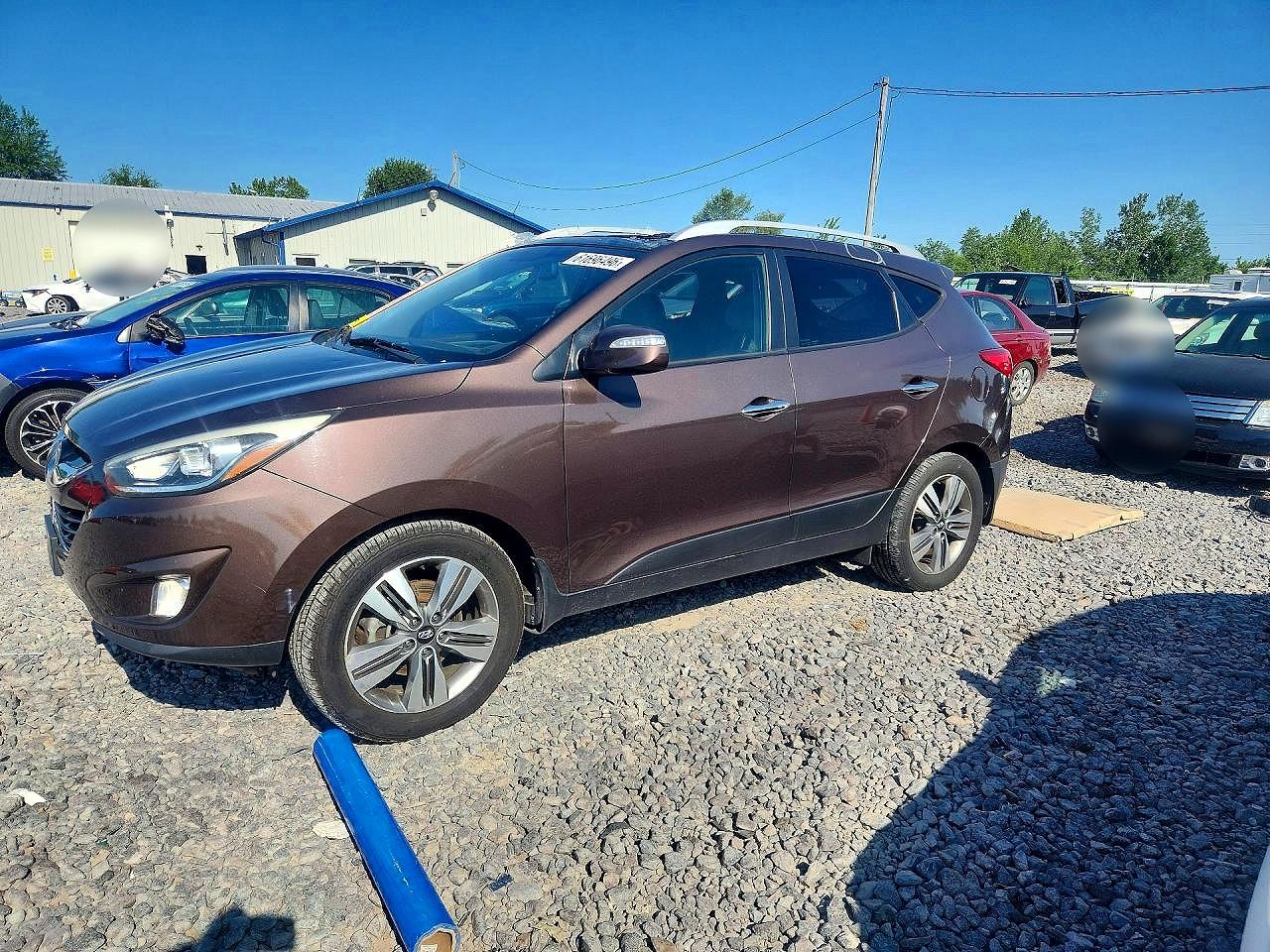 KM8JU3AG1FU981989 · 2015 HYUNDAI TUCSON