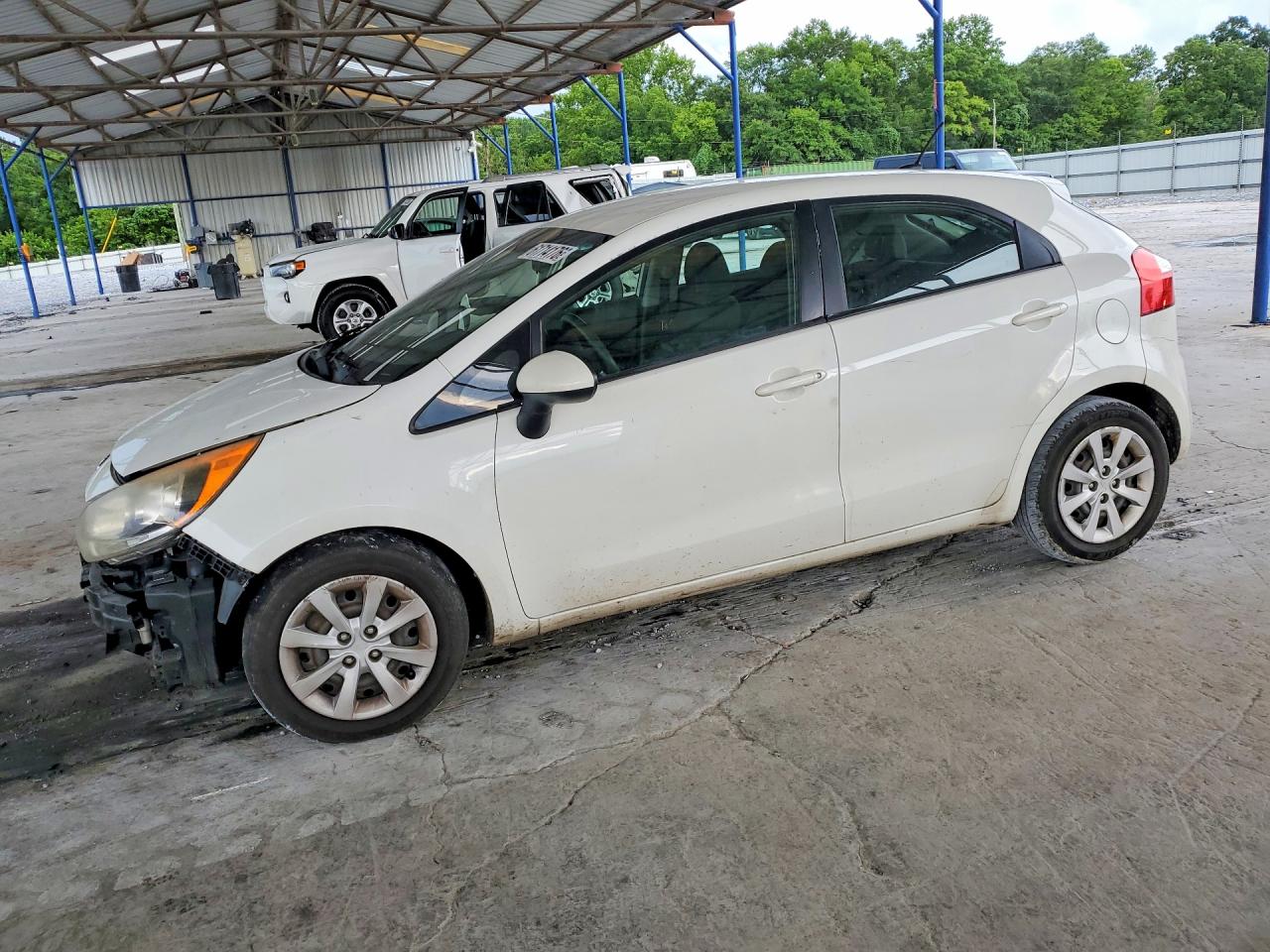 KNADM5A33C6039871 · 2012 KIA RIO