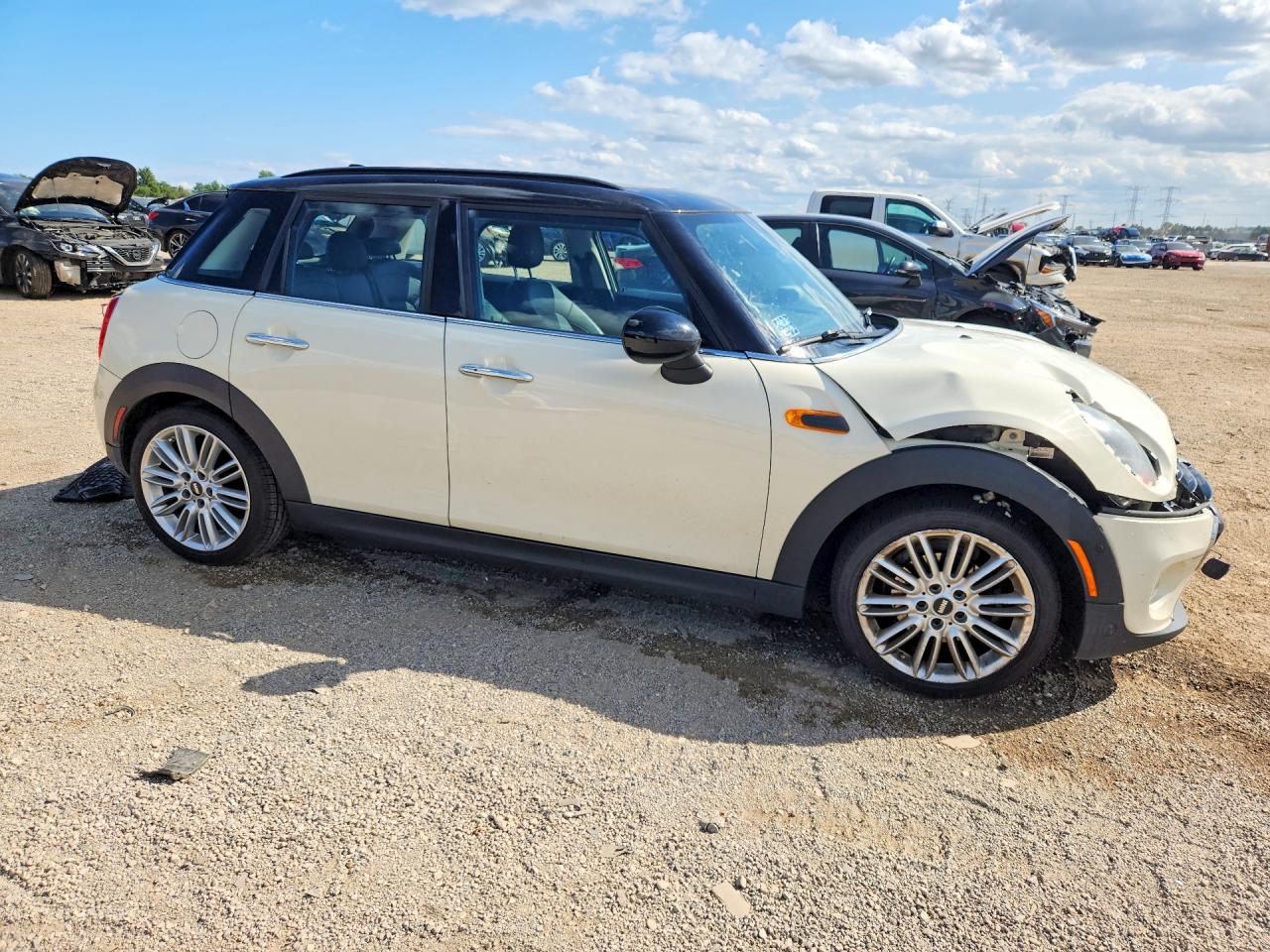 WMWXU1C54J2F80648 · 2018 MINI COOPER · 4/12