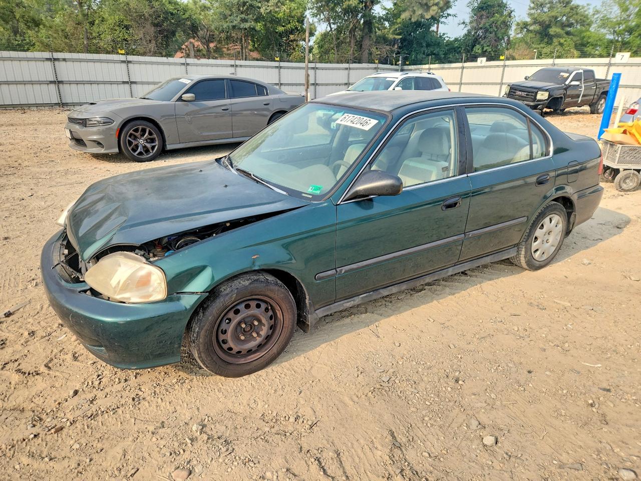 1HGEJ6676XL004199 · 1999 HONDA CIVIC