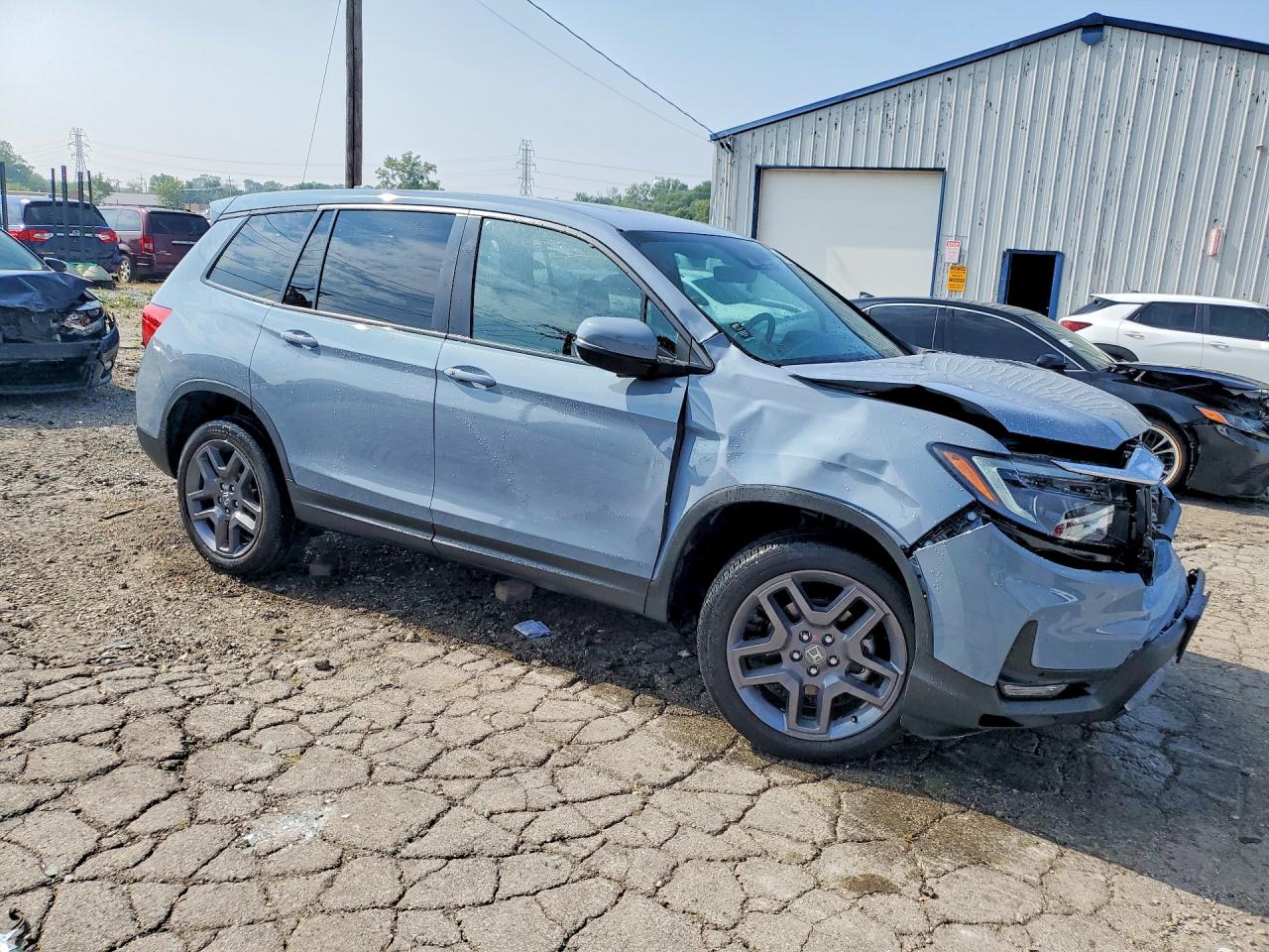 5FNYF8H52NB030271 · 2022 HONDA PASSPORT · 4/13
