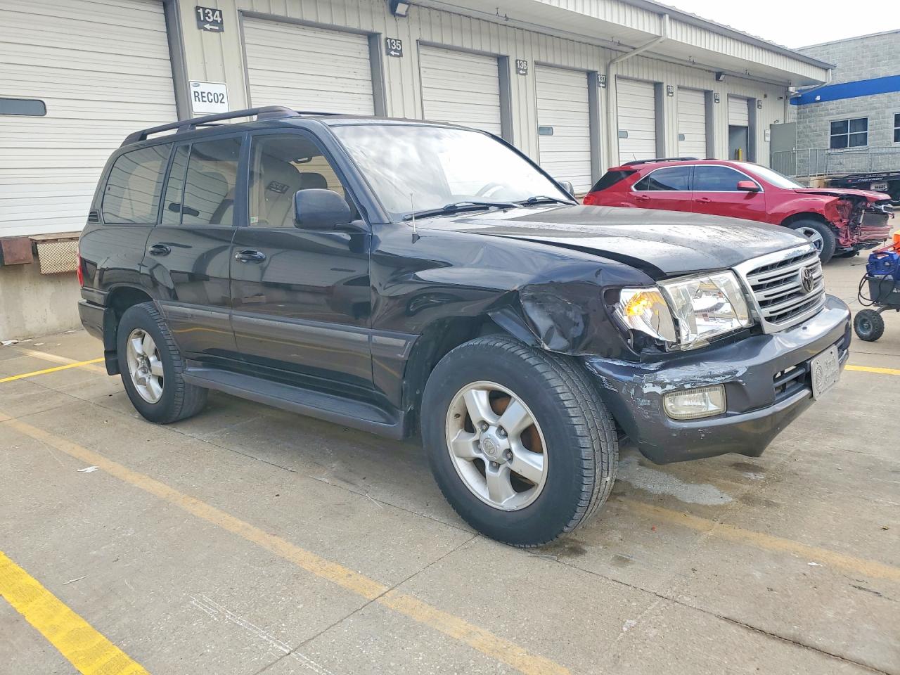 JTEHT05J732036915 · 2003 TOYOTA LAND CRUISER · 4/13