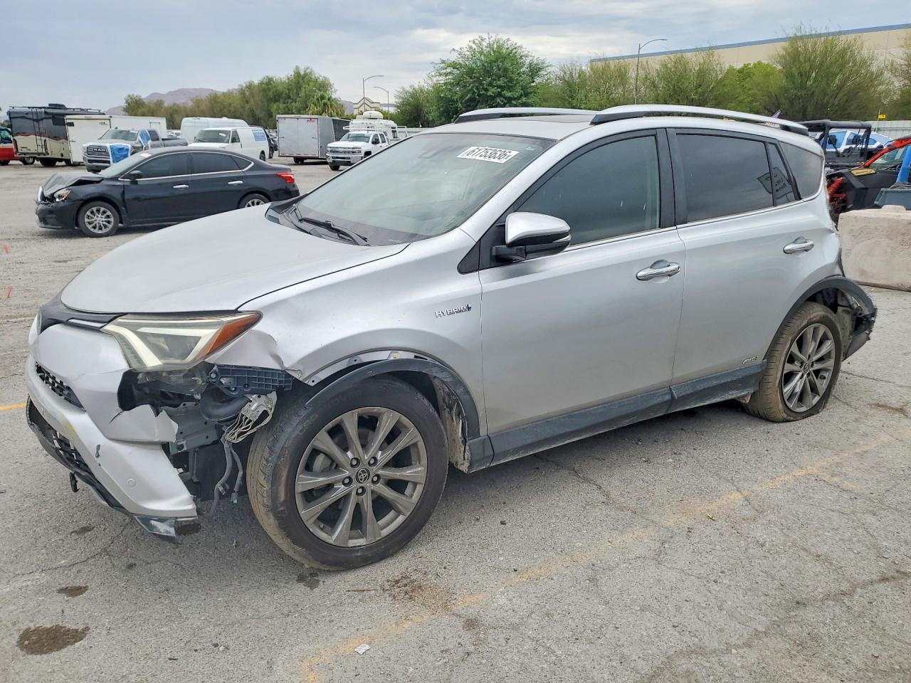 JTMDJREV6GD010848 · 2016 TOYOTA RAV4 HV