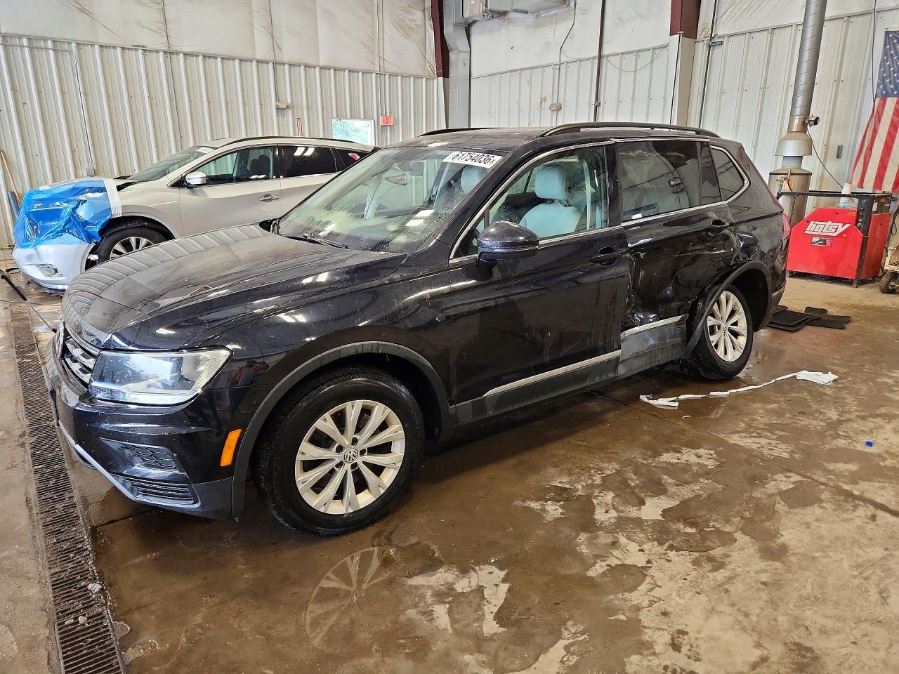 3VV2B7AXXJM049942 · 2018 VOLKSWAGEN TIGUAN