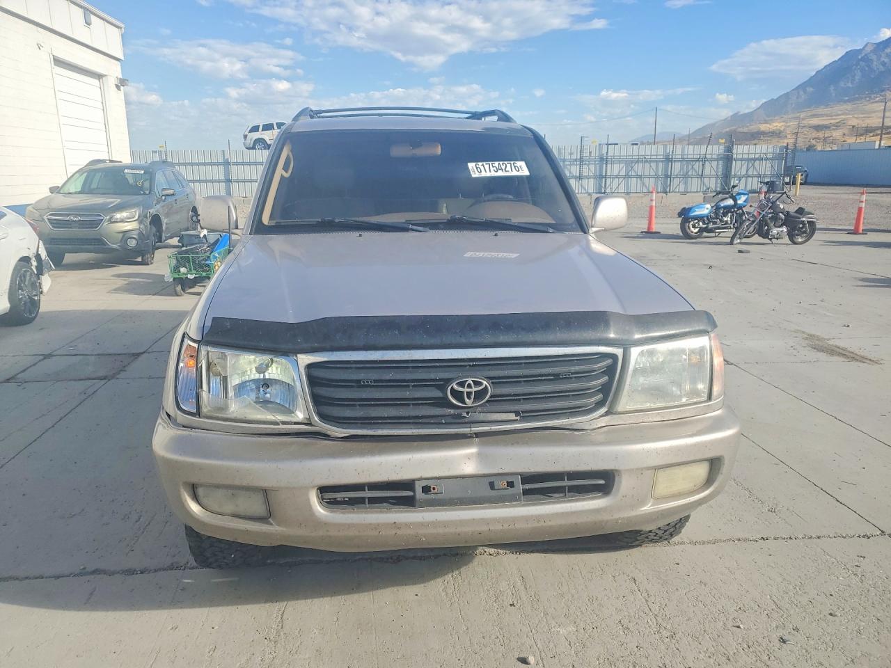 JT3HT05J6X0061668 · 1999 TOYOTA LAND CRUISER · 5/12
