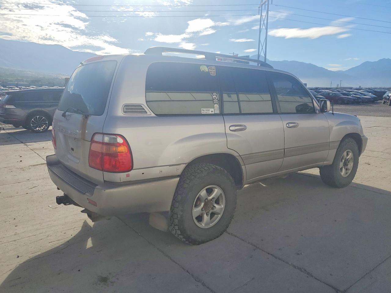 JT3HT05J6X0061668 · 1999 TOYOTA LAND CRUISER · 3/12