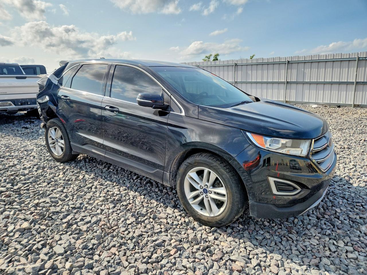 2FMTK3J88FBC42504 · 2015 FORD EDGE · 4/14