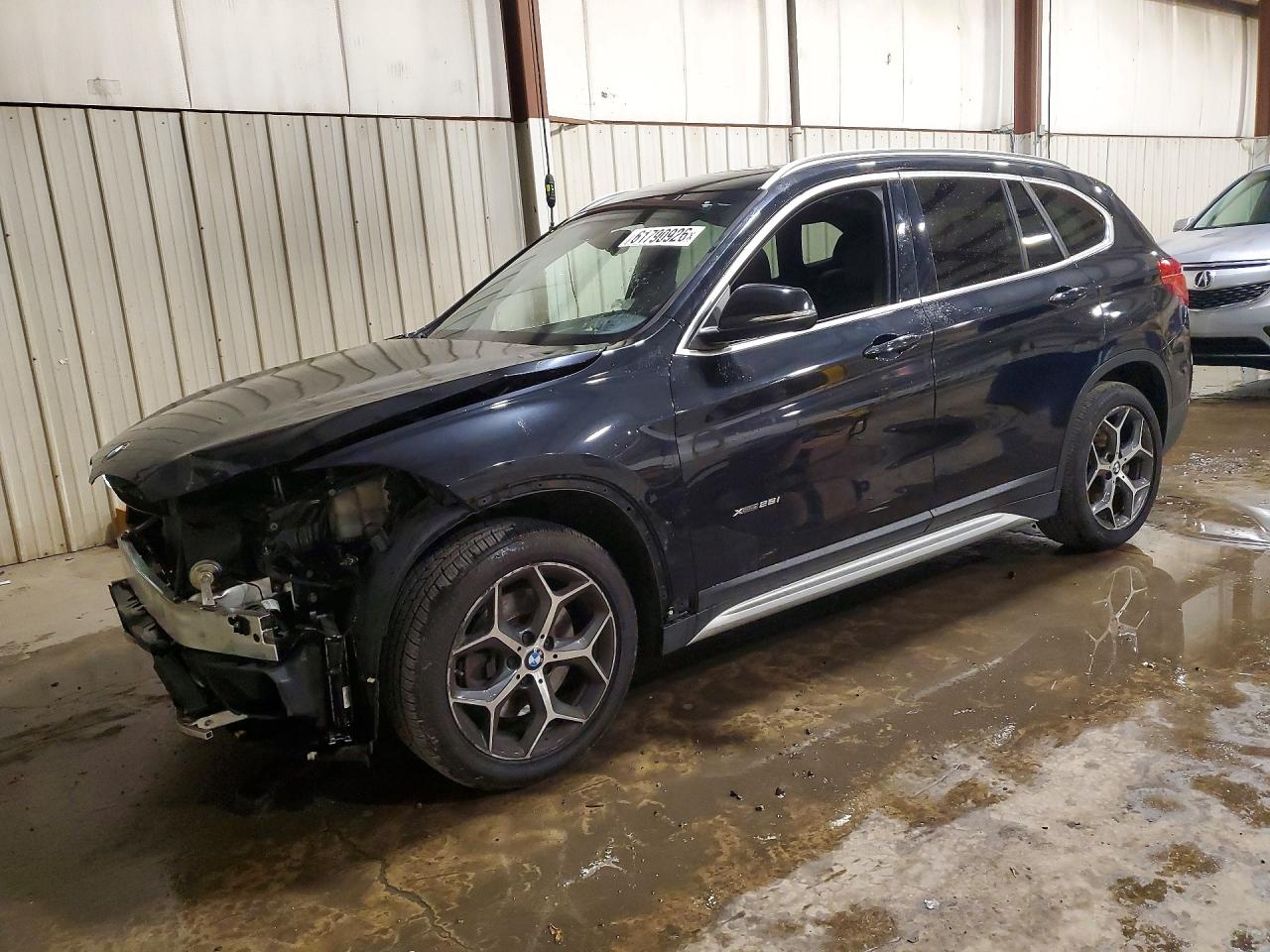 WBXHT3C31GP883886 · 2016 BMW X1