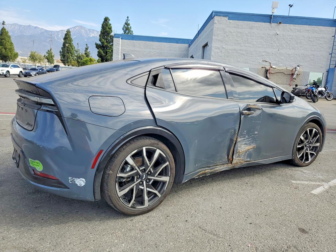 JTDACACU6P3001078 · 2023 TOYOTA PRIUS PRIME · 3/12