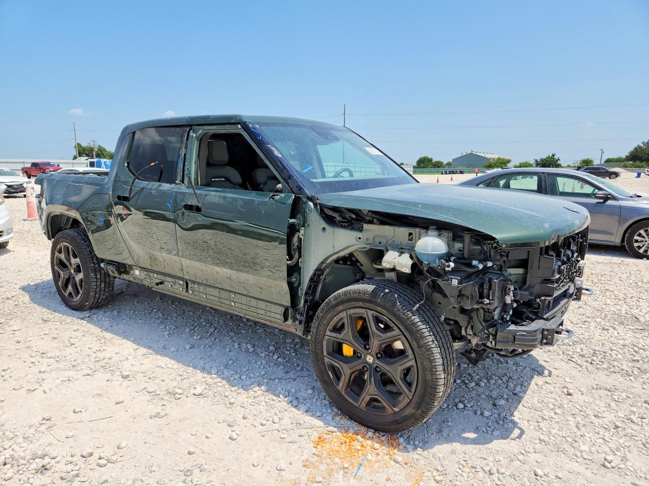 7FCTGAAA8PN000888 · 2023 RIVIAN R1T · 4/13
