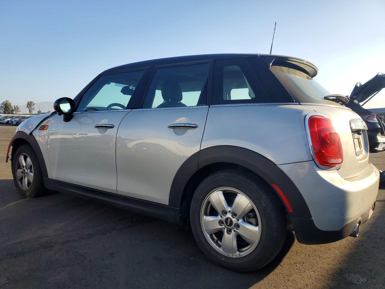 WMWXU1C55G2D10823 · 2016 MINI COOPER · 2/12