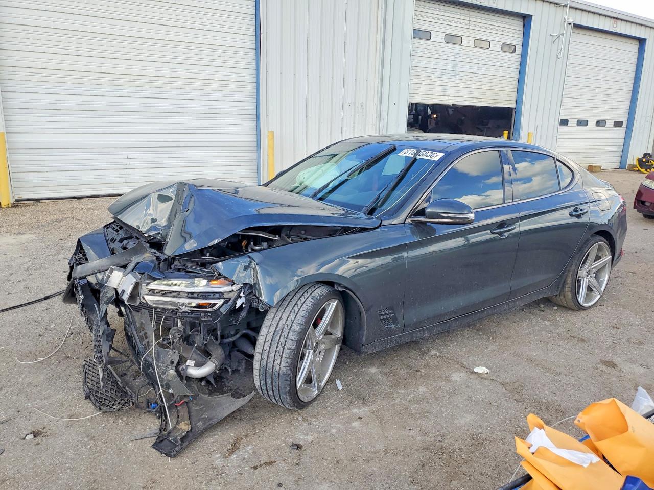 KMTG34TA1PU111498 · 2023 GENESIS G70