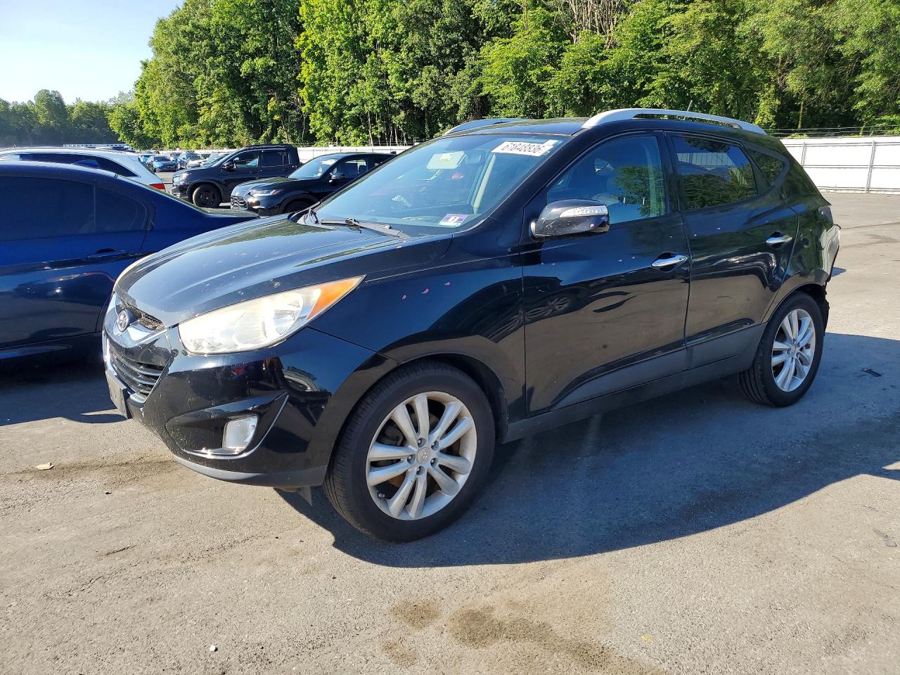 KM8JU3AC5DU703414 · 2013 HYUNDAI TUCSON
