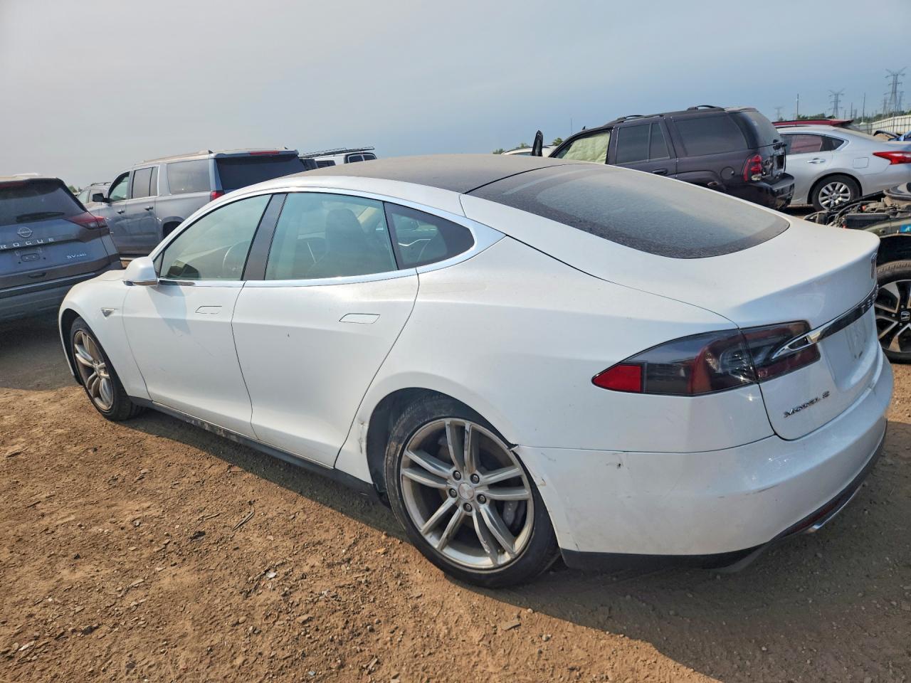 5YJSA1H16EFP51900 · 2014 TESLA MODEL S · 2/12