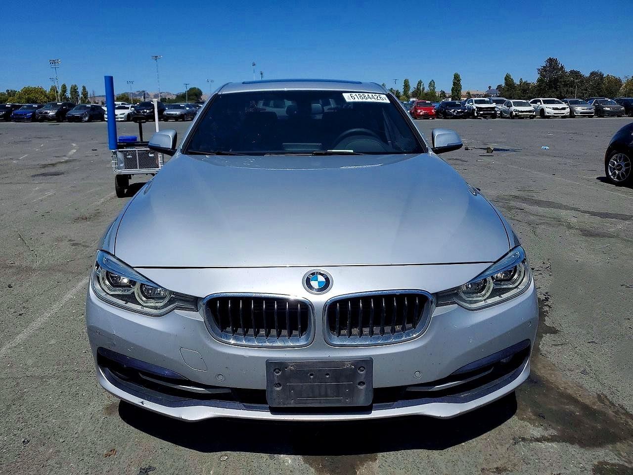 WBA8E1C57HK895095 · 2017 BMW 330E · 5/12