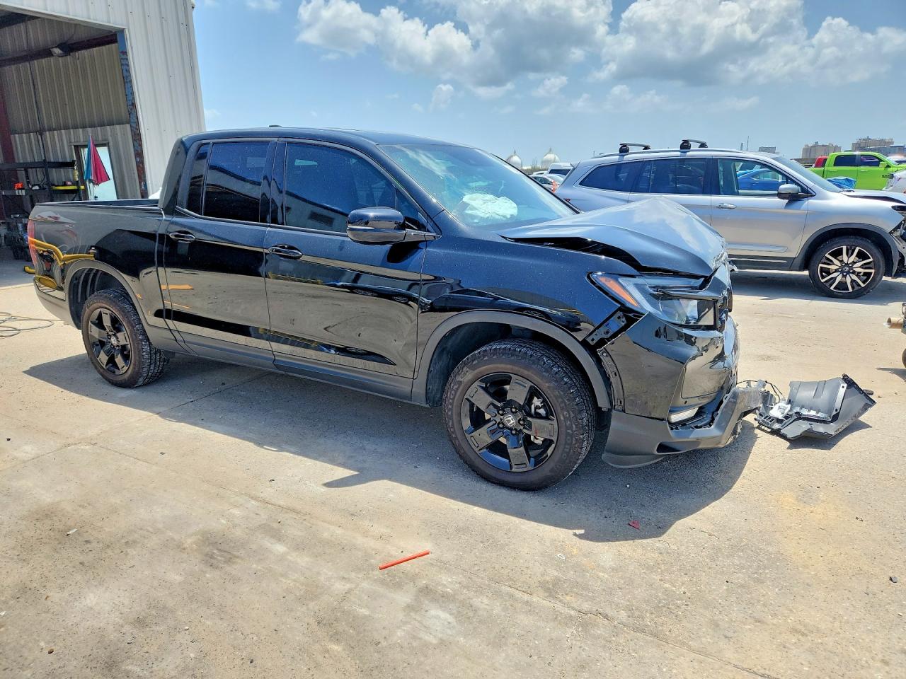5FPYK3F8XRB015977 · 2024 HONDA RIDGELINE · 4/12