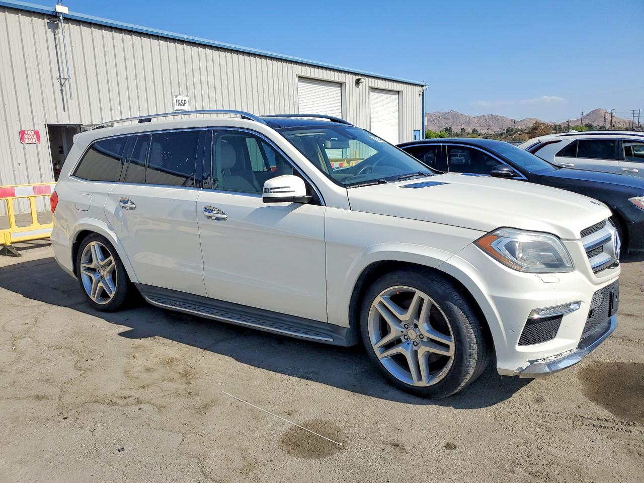 4JGDF7DEXFA544969 · 2015 MERCEDES-BENZ GL · 4/13