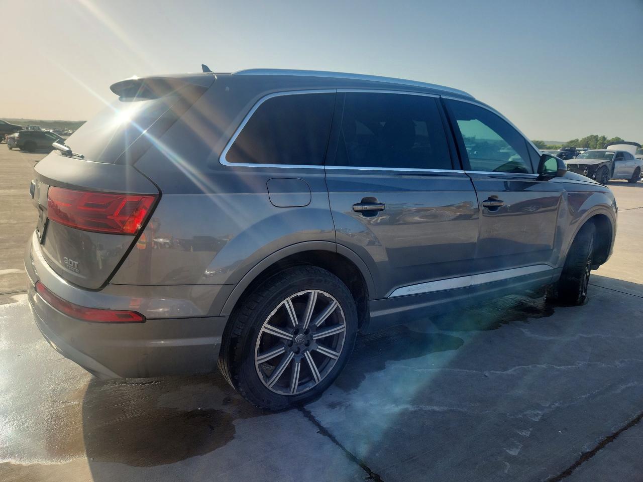 WA1AAAF74HD023498 · 2017 AUDI Q7 · 3/13