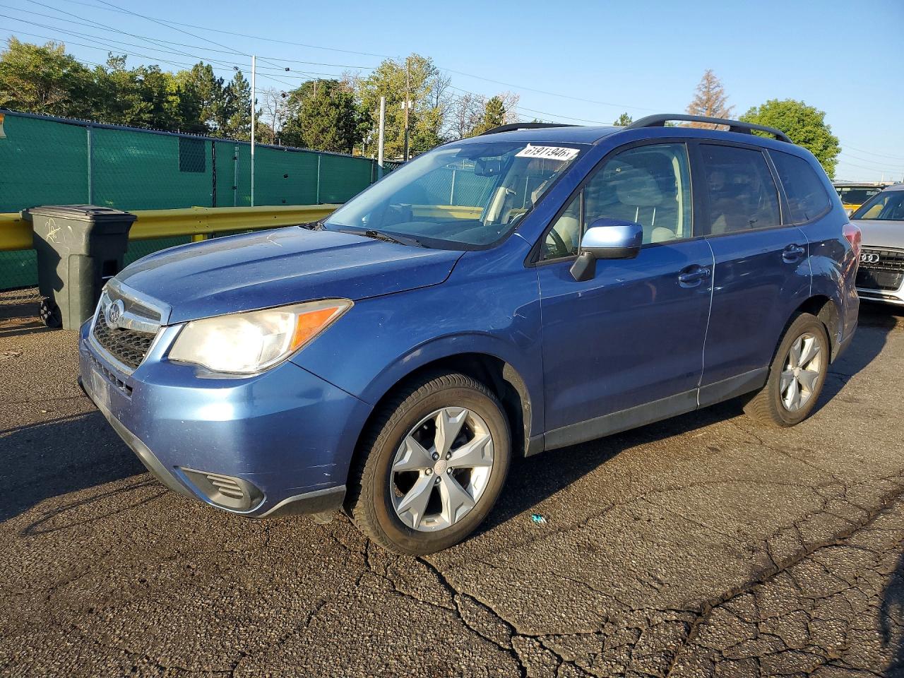 JF2SJADC4FH495024 · 2015 SUBARU FORESTER