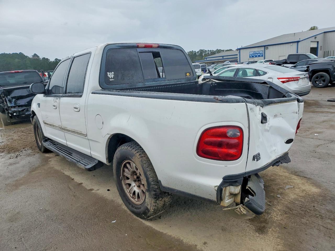1FTRW07LX1KC30687 · 2001 FORD F150 · 2/12