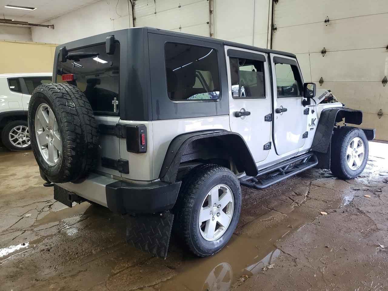 1J4BA5H15BL603943 · 2011 JEEP WRANGLER UNLIMITED · 3/13