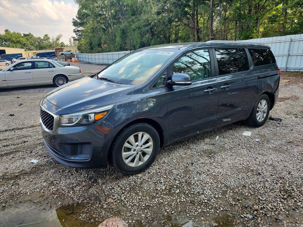 KNDMB5C1XH6332081 · 2017 KIA SEDONA
