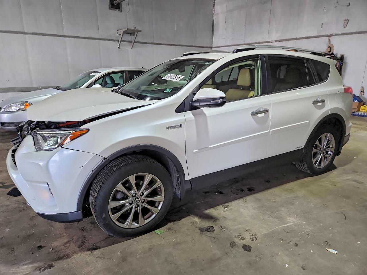 JTMDJREV0GD032103 · 2016 TOYOTA RAV4 HV