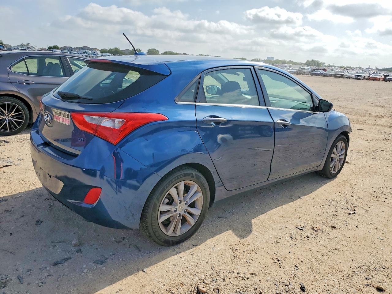 KMHD35LH9EU195017 · 2014 HYUNDAI ELANTRA GT · 3/13