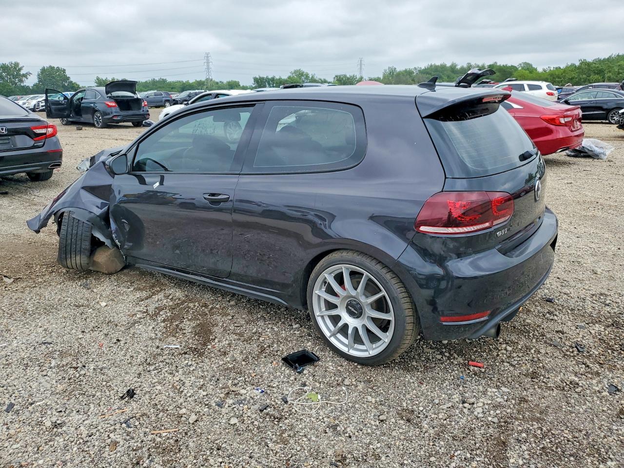 WVWFV7AJ7DW124670 · 2013 VOLKSWAGEN GTI · 2/12