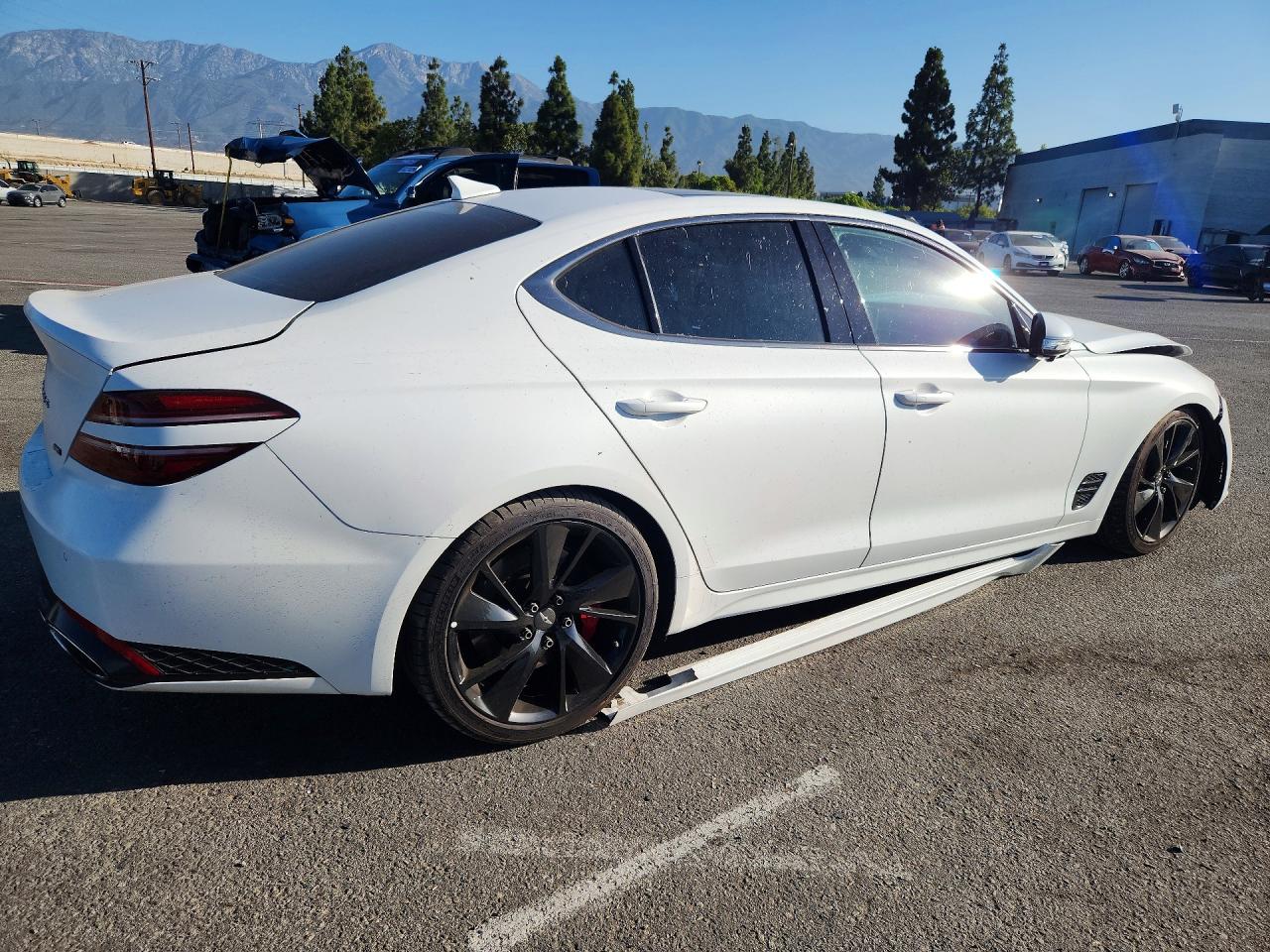 KMTG54TE6PU123885 · 2023 GENESIS G70 · 4/10