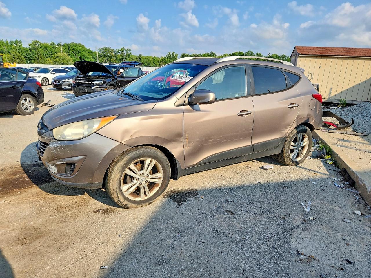 KM8JU3AC2BU171147 · 2011 HYUNDAI TUCSON