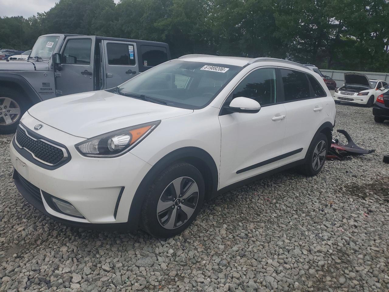 KNDCC3LC6H5048807 · 2017 KIA NIRO