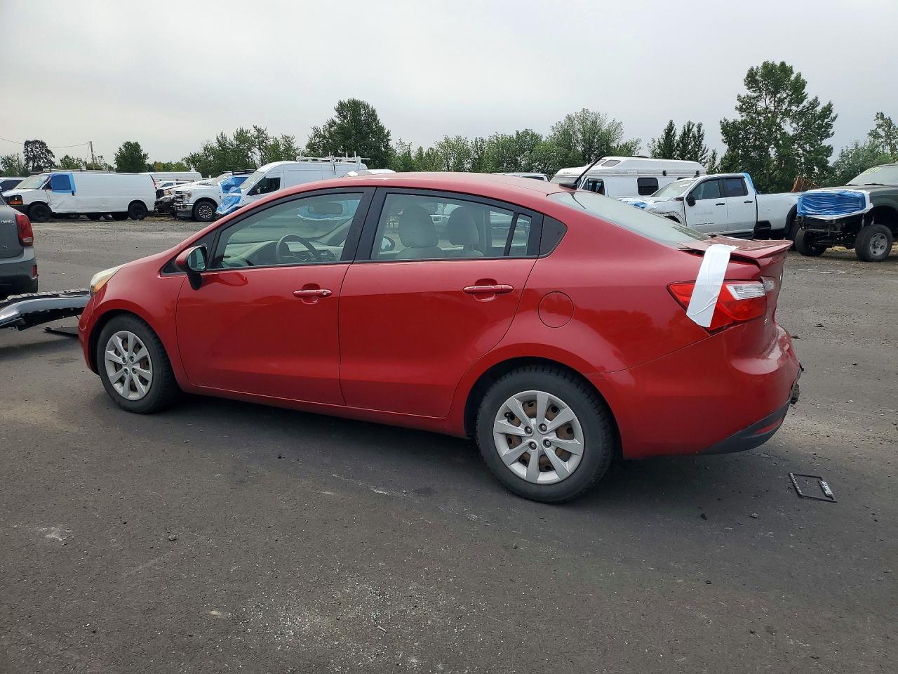 KNADM4A30D6312437 · 2013 KIA RIO · 2/12