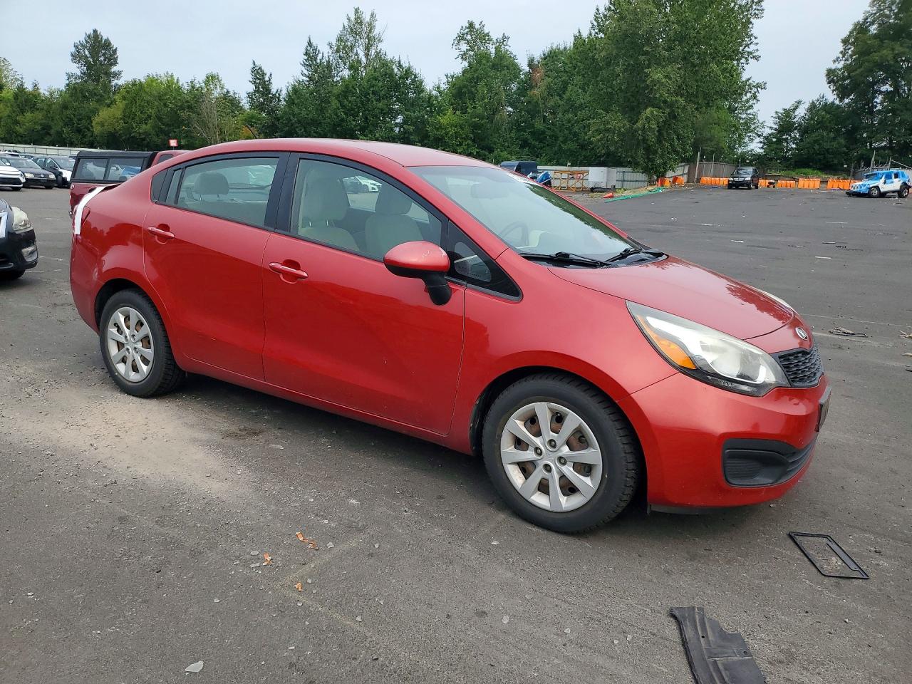 KNADM4A30D6312437 · 2013 KIA RIO · 4/12