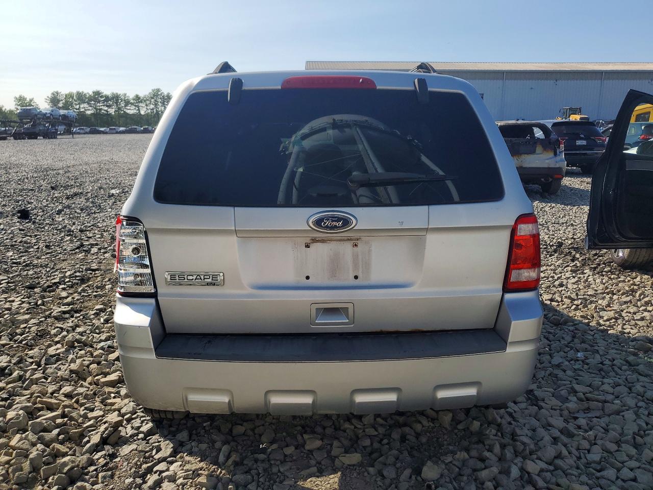 1FMCU9D73BKC11581 · 2011 FORD ESCAPE · 6/13