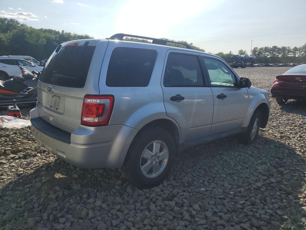 1FMCU9D73BKC11581 · 2011 FORD ESCAPE · 3/13